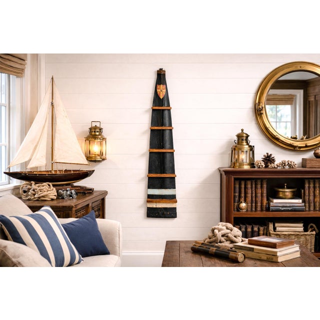 This authentic circa 1900 rowing oar blade is a rare and character-rich piece of sporting history, transformed into a...