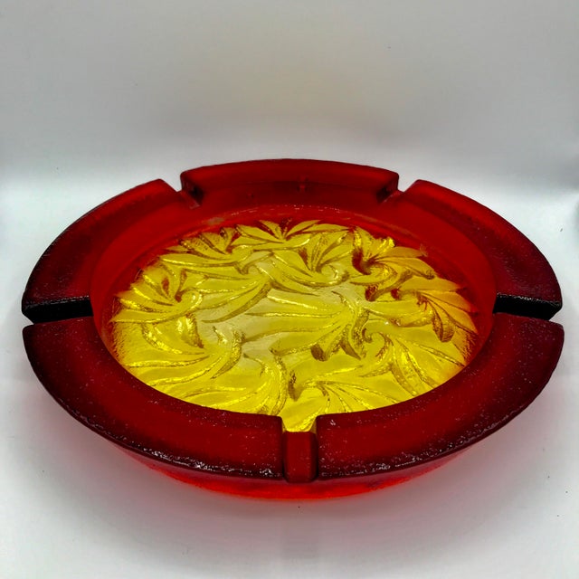 This piece is so stunning with mold blown glass textured in relief and bright amberina colors of red to the outside and...