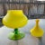 Mid-Century Empoli Apothecary Jar with yellow cased body and a green pedestal and the usual circus tent lid.Very unusual...