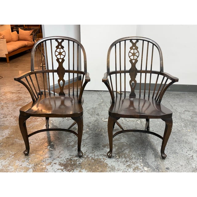 Design Plus Gallery presents a Pair of English Windsor Arm Chairs. These chairs could date back to early 20th century, or...