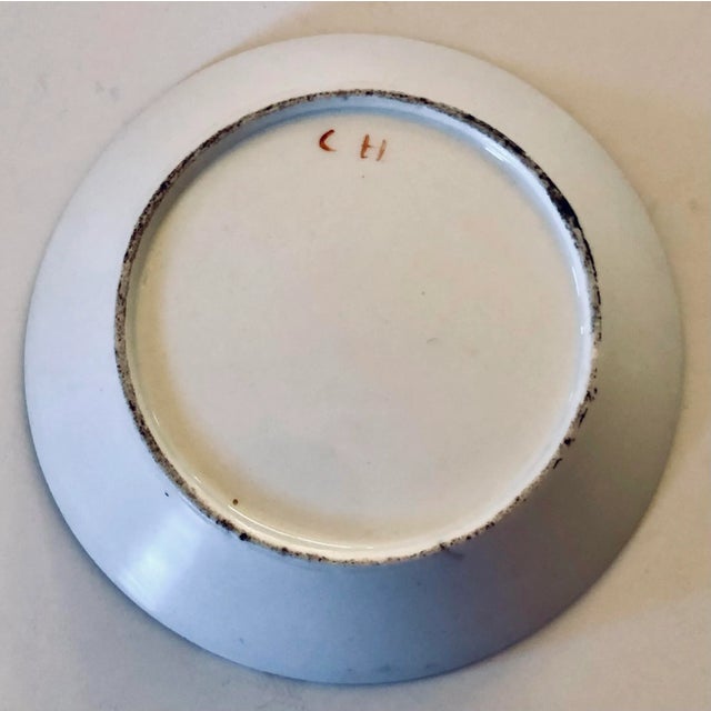 Antique continental deep saucer hand painted with violets. Beautiful little catchall for jewelry or for soap in the bath....