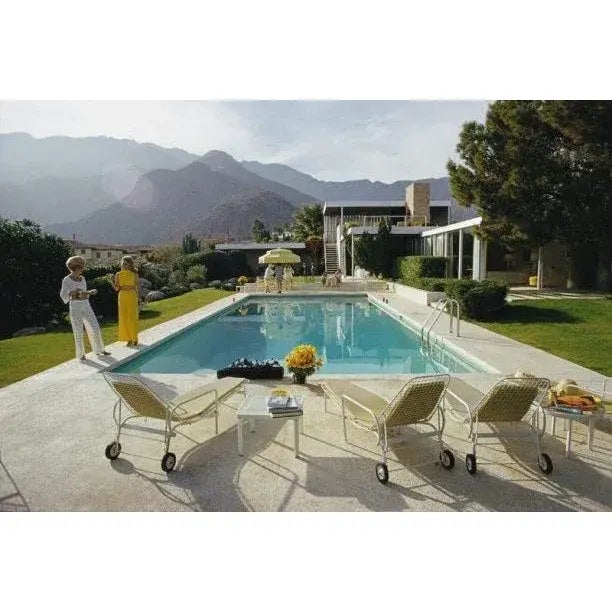 Palm Springs Pool 1970 Nelda Linsk (in yellow), wife of art dealer Joseph Linsk, and actress Lita Baron (in white sunhat)...