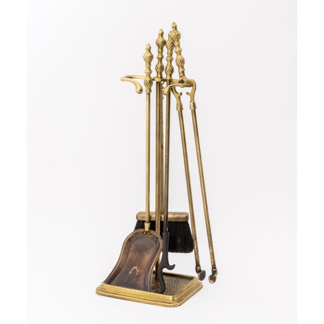 Group of Five Federal Style Brass Fireplace Tools, comprising: brush, tongs, poker, shovel, and stand. Overall: 27.75" H x...