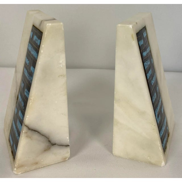Vintage pair of abstract marble and ceramic bookends. This interesting design is attributed to Fratelli Mannelli and was...