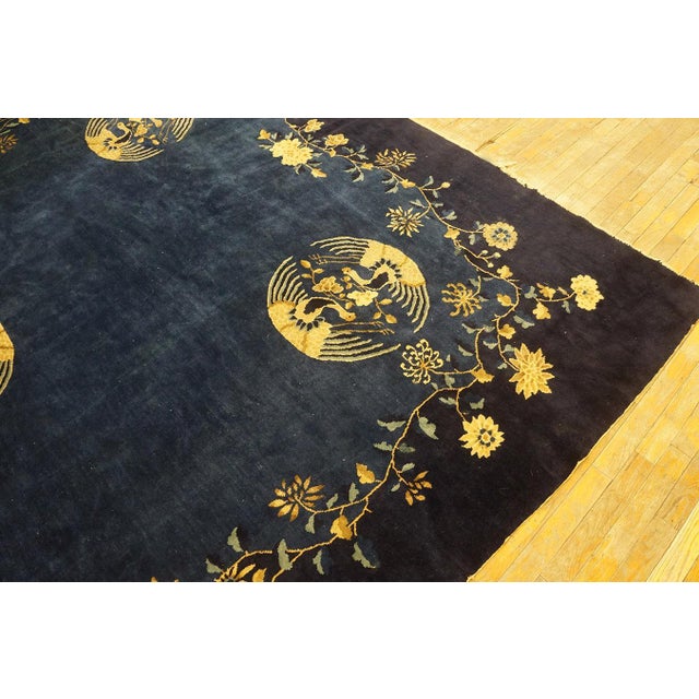 Refined Floral Border on Navy Background and Black Border Antique Chinese Peking Rug For Sale - Image 9 of 10