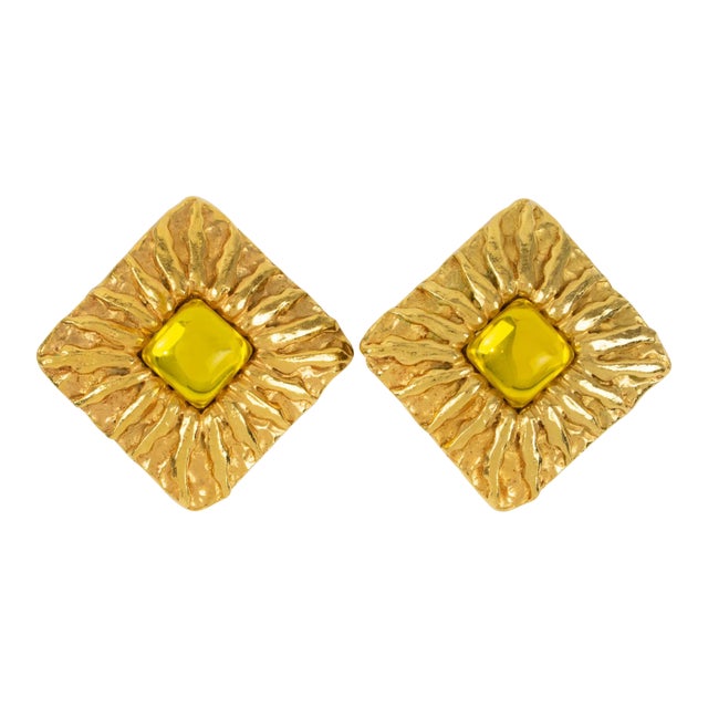 Jean Patou Paris Gilt Metal Sun Pair of Clip Earrings With Yellow Poured Glass Cabochon For Sale