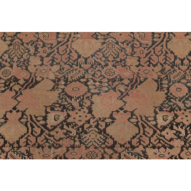 A Malayer carpet runner of the late 19th century having an dense allover pattern of abstract floral motifs and leaves in...