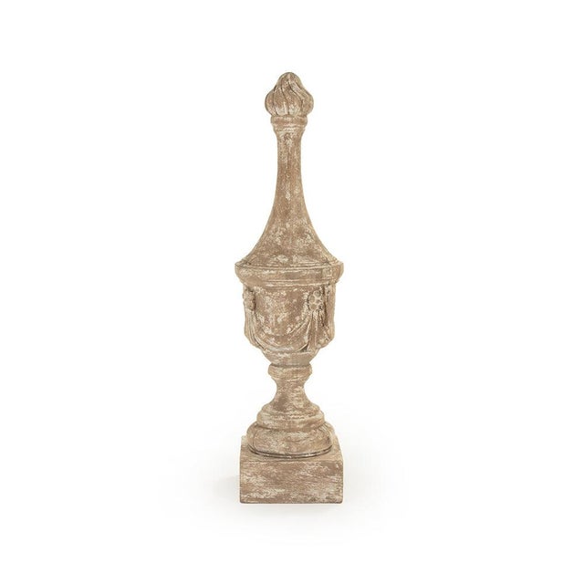 The Maddy Urn from Zentique is a tall, slender elm wood urn. The 24.5" height and natural grain add organic character....