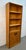 Add warmth, style, and functionality to your home with this classic Mid-Century Modern teak bookcase. Showcasing clean...