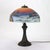 Arts & Crafts Reverse Painted Winter Landscape Lamp, Manner of Jefferson, c1920 Measures - 22" x 17" x 17" An antique...