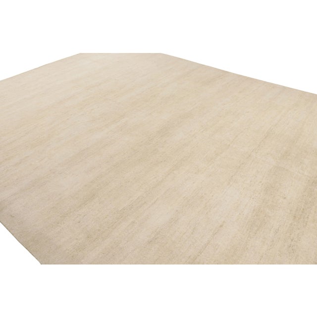 A modern textural rug from our Texture of Color line in this collection—hand-knotted in silk, this 12x15 oversized rug...