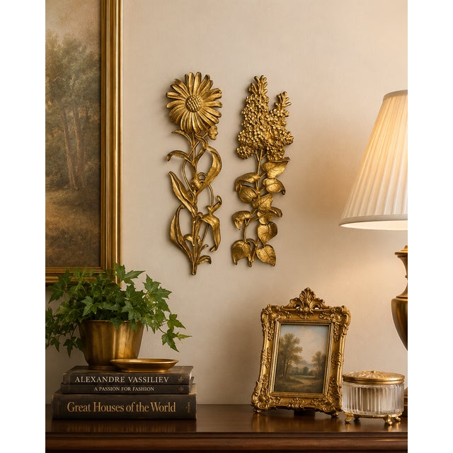 Bring classic Hollywood Regency style to your walls with this striking pair of vintage Syroco floral wall plaques, proudly...