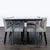 This EQ3 dining set includes a sleek rectangular table with leaf and a dark wood top and chrome legs, paired with four...