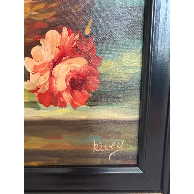 This original oil painting on canvas presents a richly composed floral still life, featuring a softly rendered ceramic...