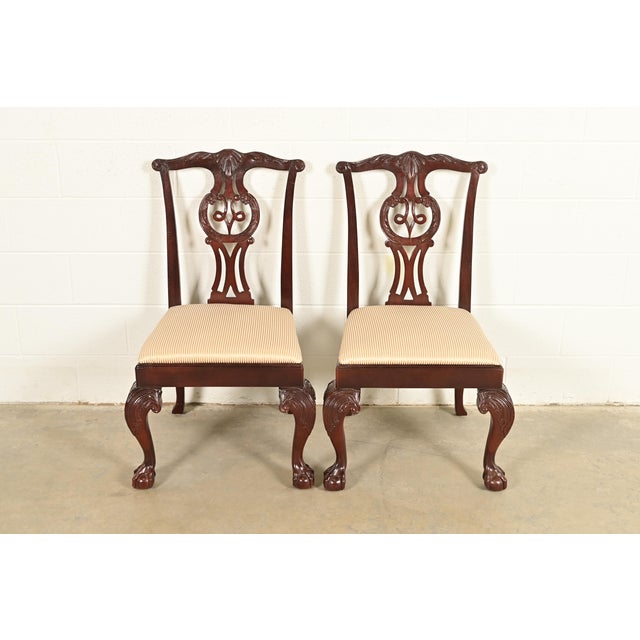 An outstanding pair of Chippendale or Georgian style side chairs or dining chairs By Baker Furniture USA, Circa Late 20th...