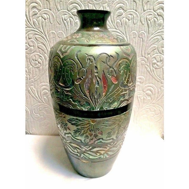 Beautiful, rare, carved antique hand made art pottery 19" tall vase in irresdescent colors. It is not signed so I don't...