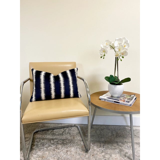 Gorgeous reimagined striped throw pillow cover in navy blue and cream. Add this vibrant pillow to your collection for a...