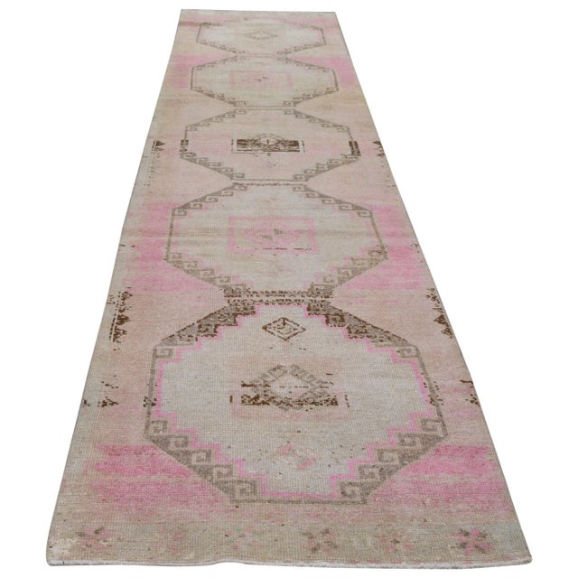 Hand-knotted with care using traditional rug making techniques, this wool rug blends timeless craftsmanship with a modern...