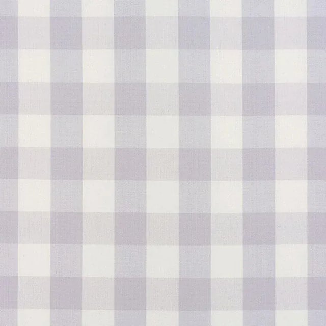 A classic one and a half-inch buffalo check, this woven cotton is a wonderful complement to both prints and plains. Sold...