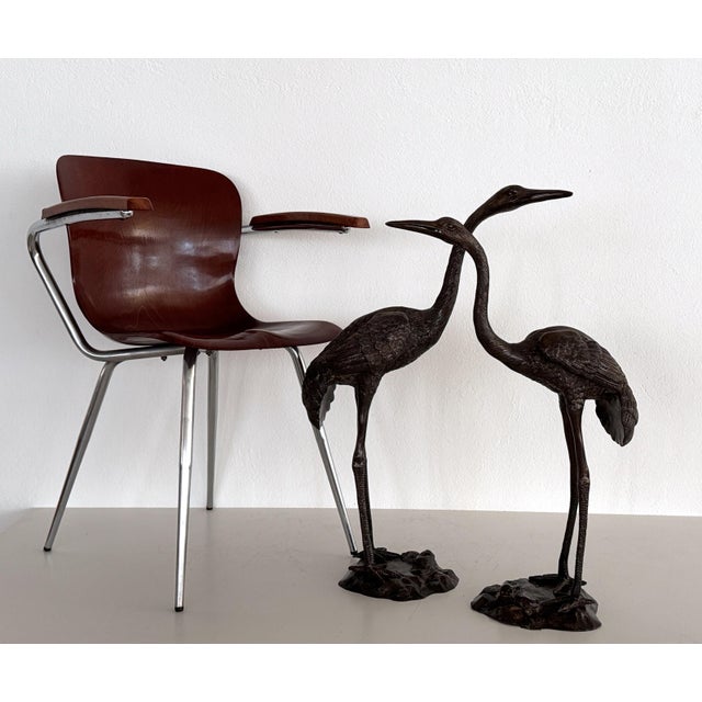 A charming, life-size pair of herons made of burnished brass. Made in Italy in the 1970s. Both sculptures have a beautiful...