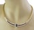 This is a stunning Estate collar necklace, crafted from 18k yellow gold featuring a 4 inches long curved centerpiece with...