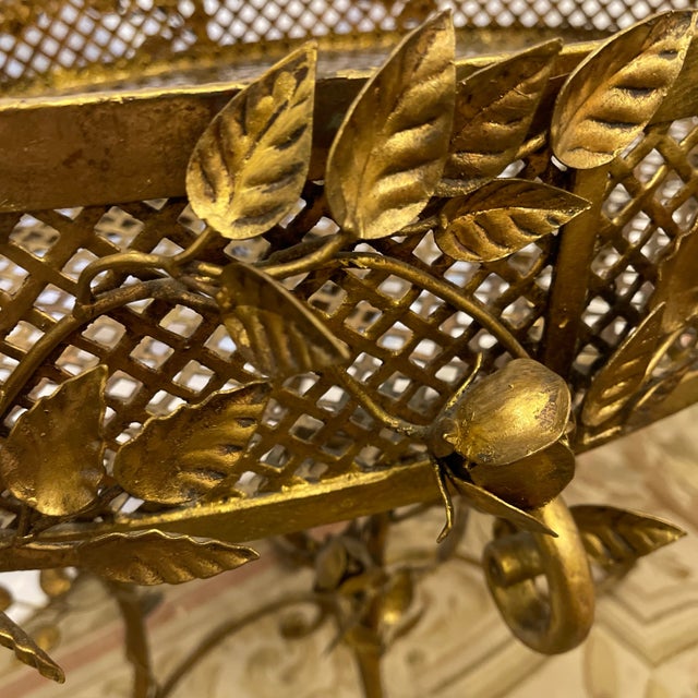 Antique gold leaf cast iron floral jardiniere with a dore floral finish. CIRCA: middle 20 TH Ct ORIGIN: France