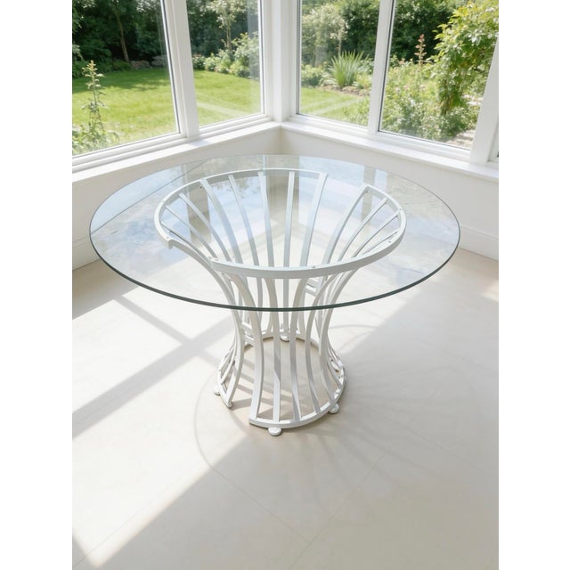 We have for your consideration a very beautiful vintage patio or dining table attributed to Arthur umanoff for shaver...