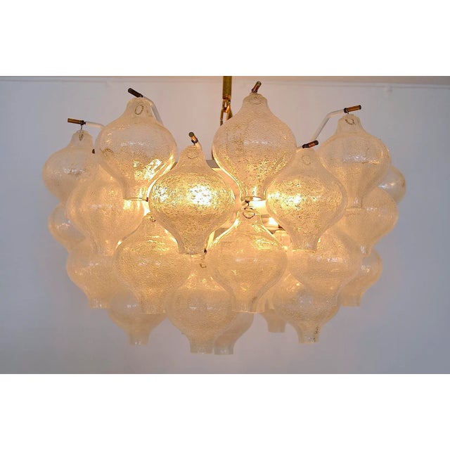 Austrian chandelier of the viennese j. T. Kalmar workshops. The chandelier model tulipan gave the candlestick with its...