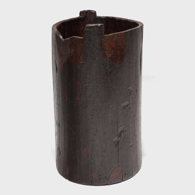 This rustic wooden container dates to the mid 19th century and was once used to store dry goods or household items in a...