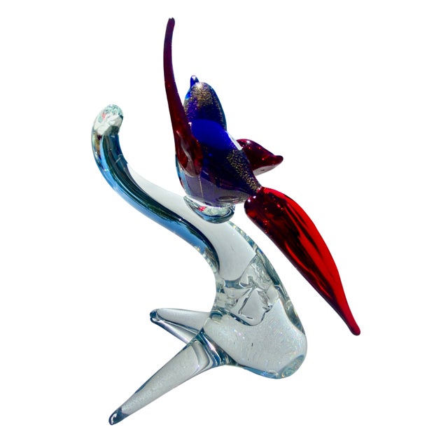 Bring a splash of color and movement into your home with this vibrant Murano glass bird. With its bold cobalt blue beak,...