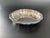 This scalloped bowl was produced by Oneida to complement their "Modern Baroque" flatware pattern, ideal for serving...