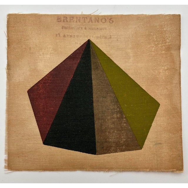 A striking vintage geometric abstraction featuring a sculptural interplay of angular planes in burgundy, charcoal, olive...