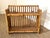 Rattan tortoise bamboo wall shelf or tabletop shelf. Woven grasscloth surfaces. Height between shelves measure 9.5"