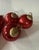 This lot of 8 vintage Christmas ornaments features a kugel style design with hearts, balls, and teardrop shapes, all in a...