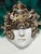 This ceramic mask was handmade by the Artisans of Casin dei Nobili, one of Venice's most prestigious Mask Makers. Made...