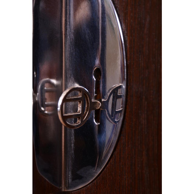 This elegant two-door wardrobe is a representative piece from the renowned manufacturer Vichr a spol. in Lysá nad Labem,...