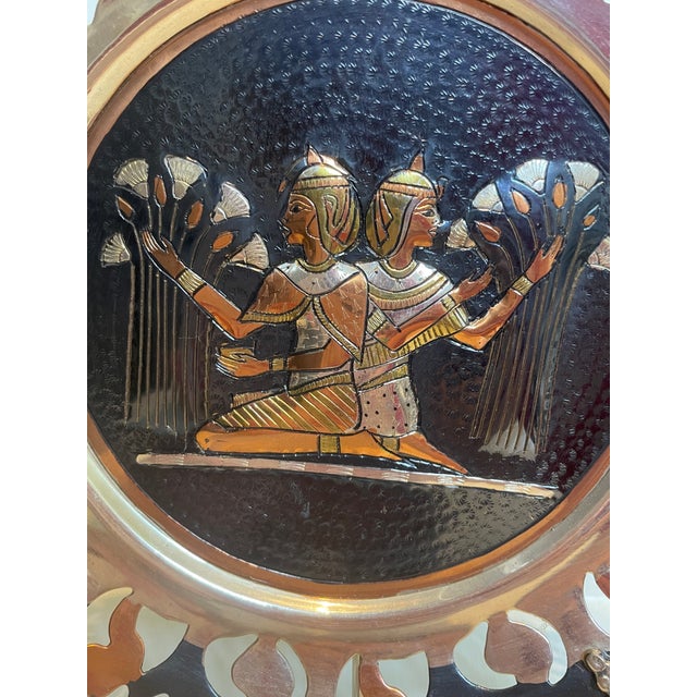 This Vintage Egyptian Wall Decor plate is handcrafted using Brass, Copper and Silver inlays and features two figures,...