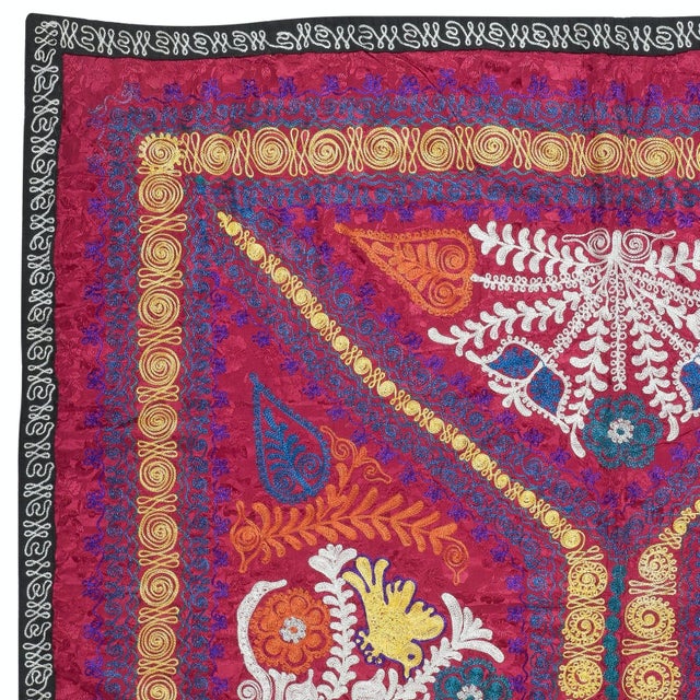 Introducing our exquisite new suzani hand embroidered wall hanging, a captivating piece that combines ancient...