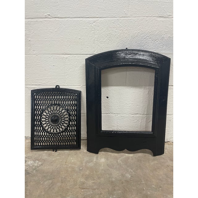 A turnkey piece of 19th-century Southern architecture, this striking 2-piece cast-iron fireplace summer surround and...