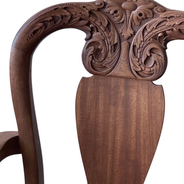 stunning George II-style armchair, beautifully crafted with rich solid wood and intricate detailing. Inspired by 18th-...