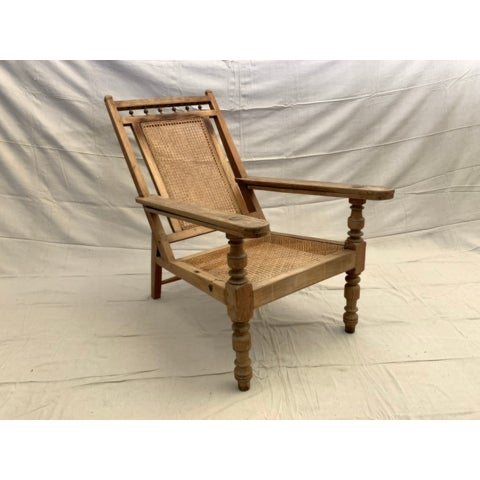 An authentic 19th-century Anglo-Indian colonial planter's lounger sourced from Karachi, Pakistan, featuring a beautifully...