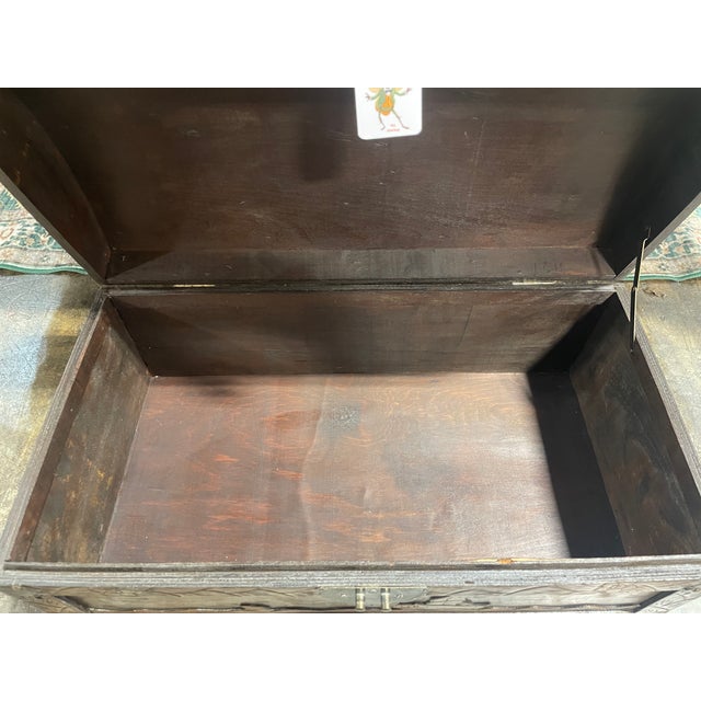 This chest is absolutely beautiful and in great condition! The chest features detailed carvings, including a central...