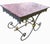 This is an antique cast iron pastry table, with the soft gray painted finish and gilding of the decorative finials and...