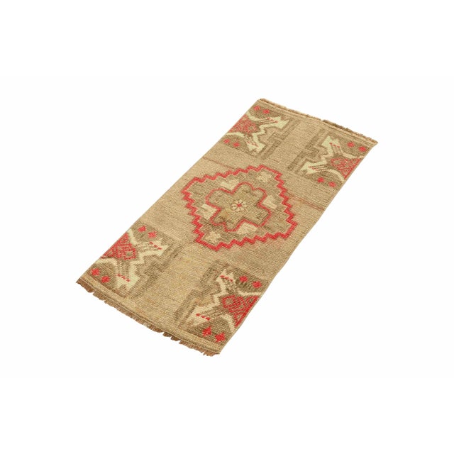 Vintage Handknotted decorative mini rug from Kars region of Turkey. Approximately 45-55 years old. In very good condition.