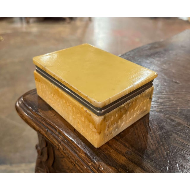 Crafted in France circa 1950, this elegant vintage jewelry box combines the natural beauty of yellow marble with the clean...