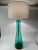 Midcentury modern turquoise glass lamp. Imagine a very tall drum shade pair with this fantastic piece of artistry.