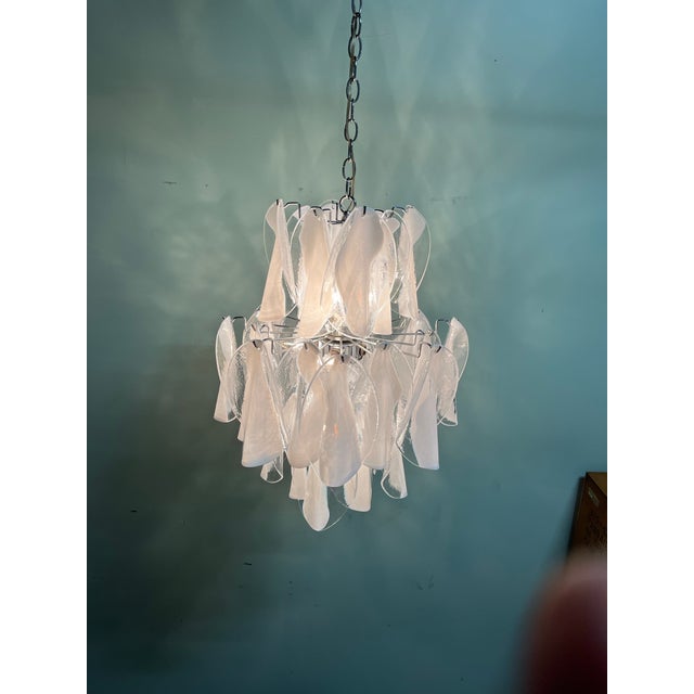 Unique Italian Murano chandelier made with 36 large and impressive white petals on a nickel-plated metal frame. 3 tier...