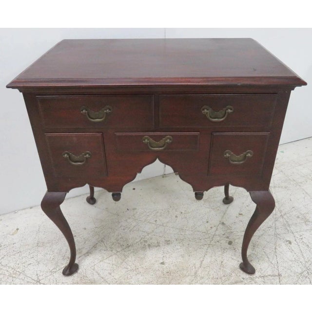Walnut Queen Anne lowboy made by Chester County Pennsylvania cabinet maker Robert T. Hogg, signed and dated on back edge...
