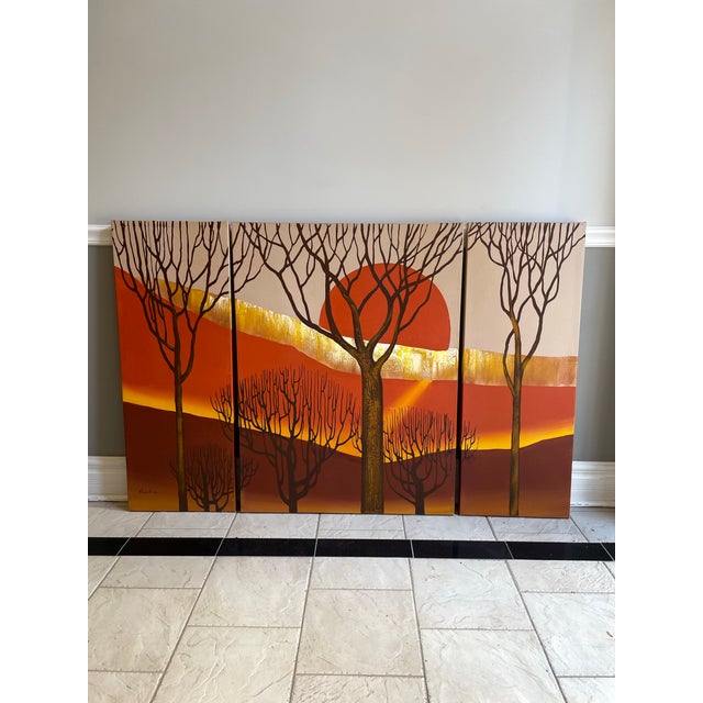 A dramatic and beautifully hand-painted 1970s Letterman style triptych featuring a vivid sunset landscape rendered in warm...