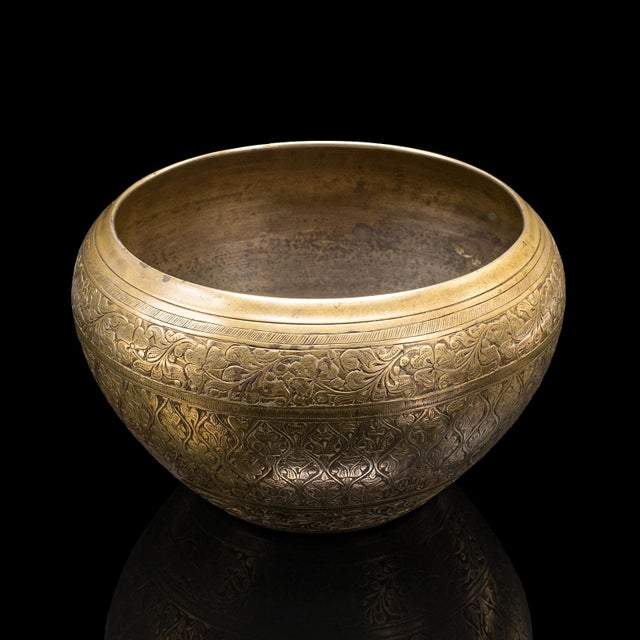 This is a vintage offering bowl. A South East Asian, brass relief jardiniere pot, dating to the Art Deco period, circa...